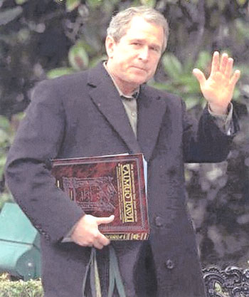 http://www.texemarrs.com/images/bush_with_talmud.jpg