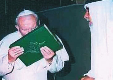 Pope John Paul II kisses the Koran