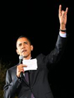 Obama shows the Devils Horns sign